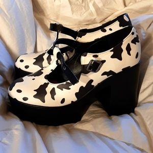 Cow print platform